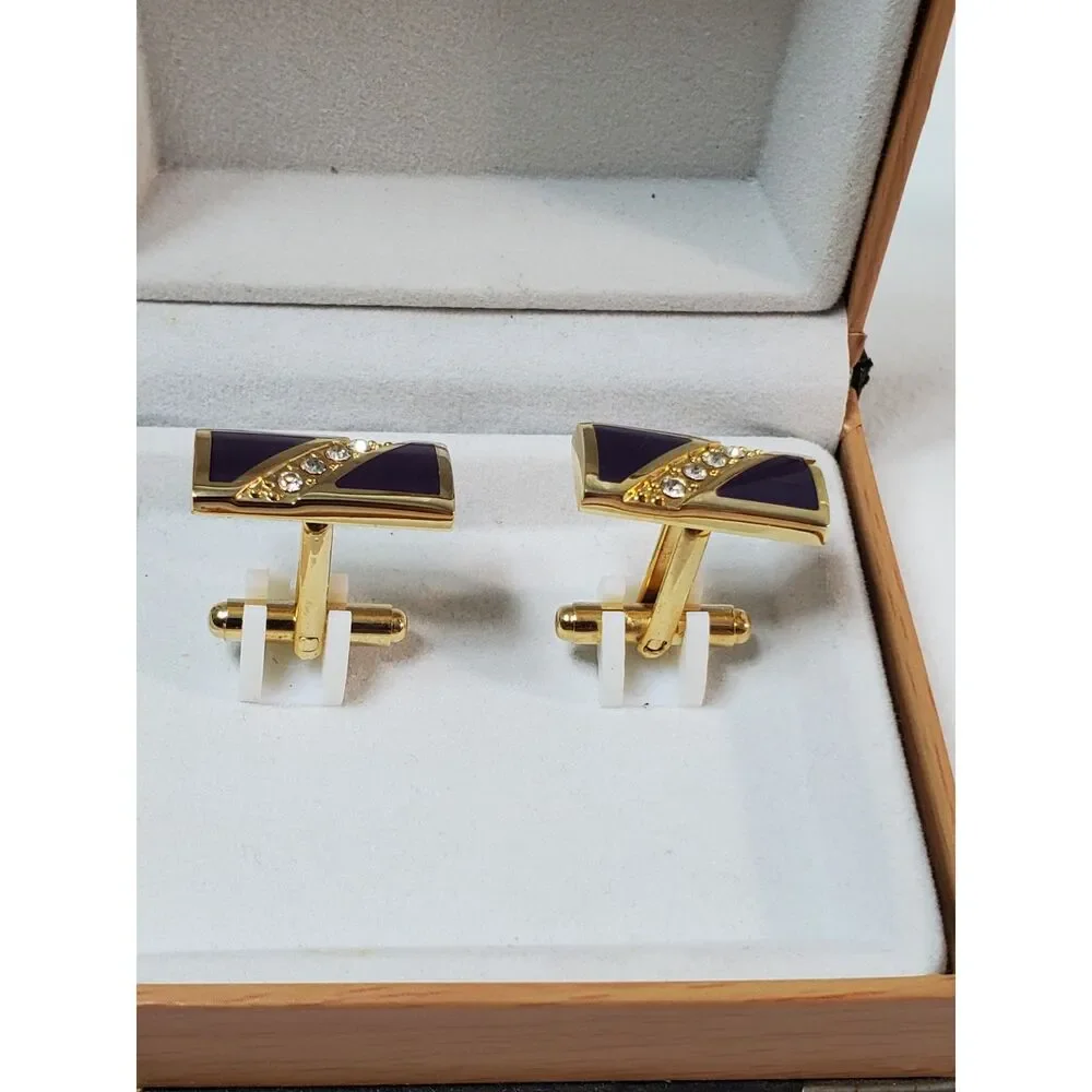 The Cufflinks are gold-toned with purple inlay Great Gift
